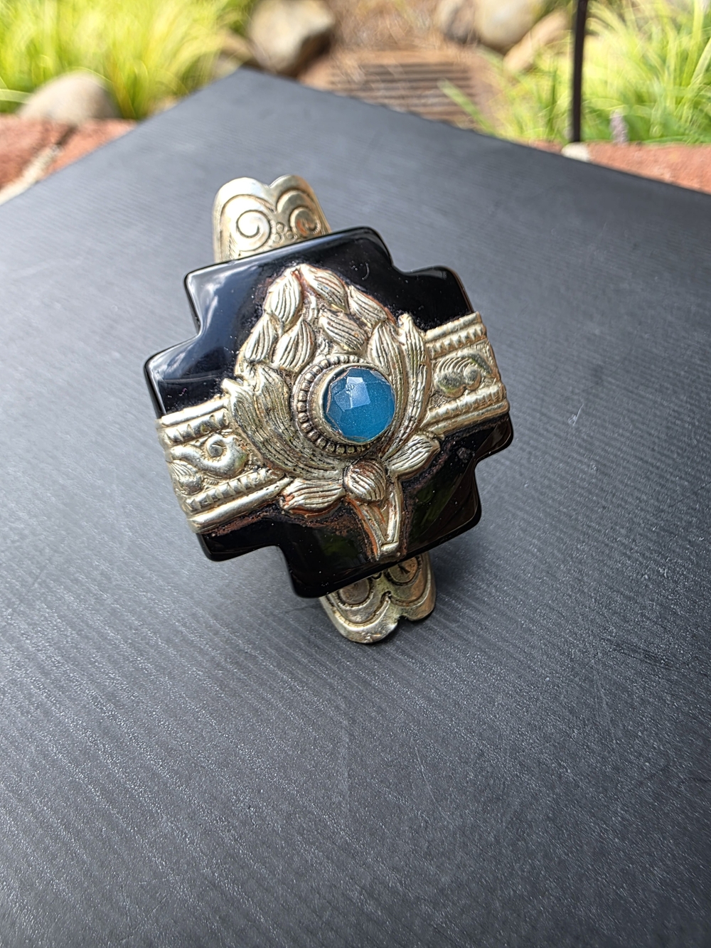 Vintage-Style Black and Gold Lotus Ring with Blue Stone